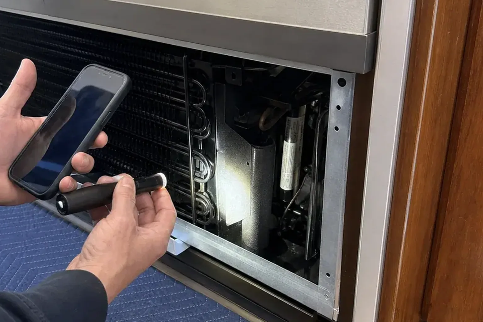 A Sub-Zero control panel in a Novato kitchen displaying the 38F fresh-food and 0F freezer settings.